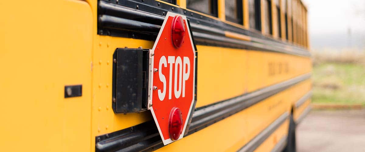 keep child safe at school bus with Devkota law firm
